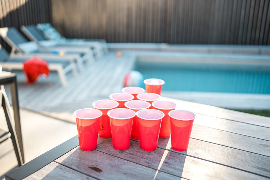 Red solo cups lined up for beer pong